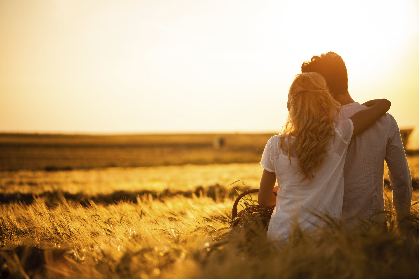 Loving couple in wheat field Loving couple in wheat field